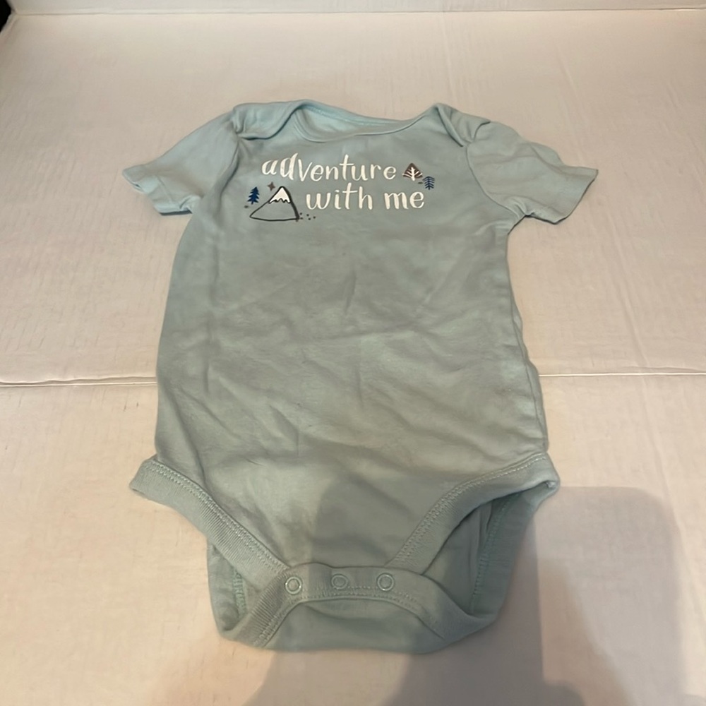 Cloud island 24 months light teal colored onesie. W/Adventure with me on front.